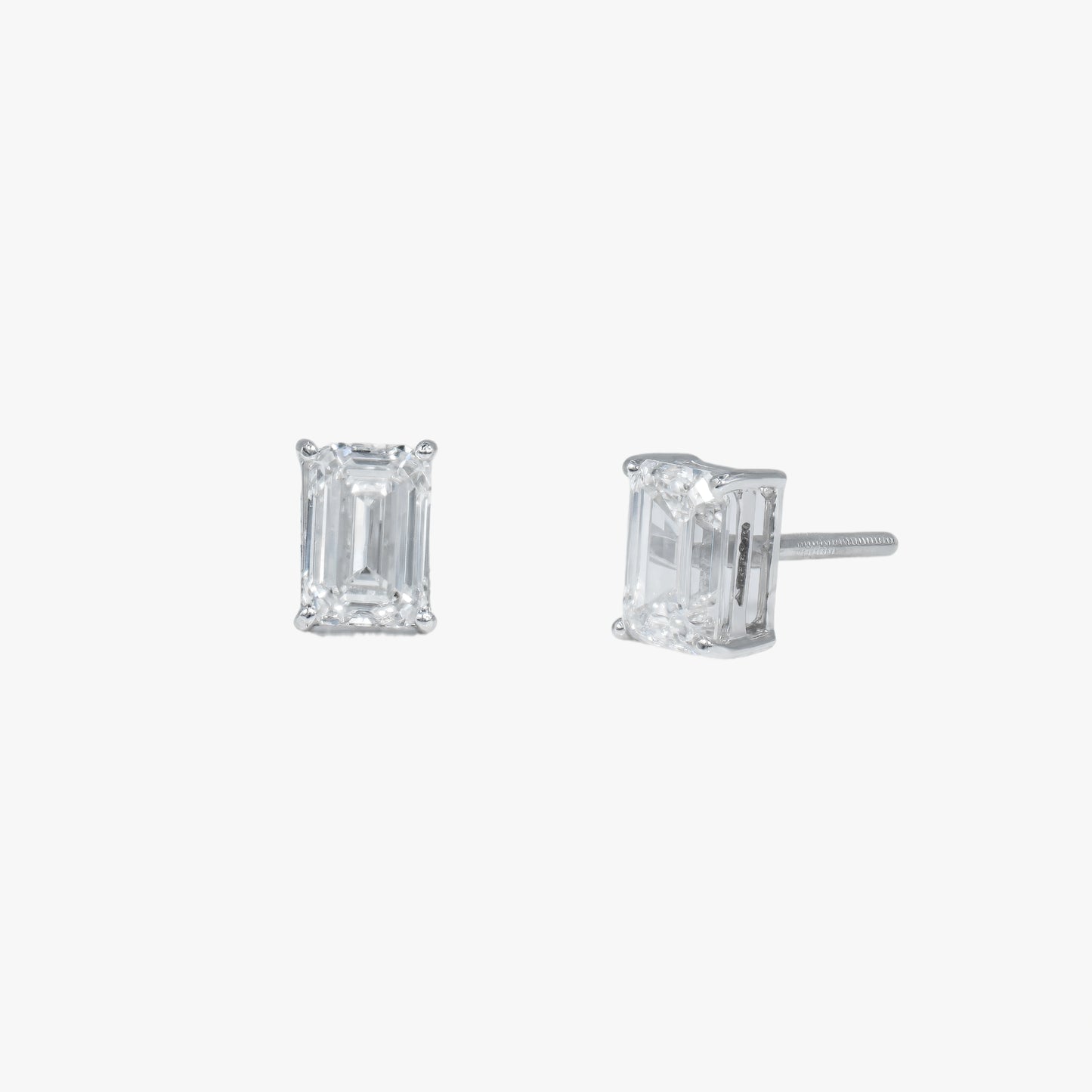 emerald solitaire studs wg