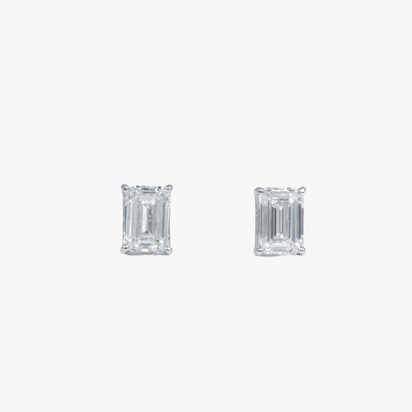 emerald solitaire studs wg