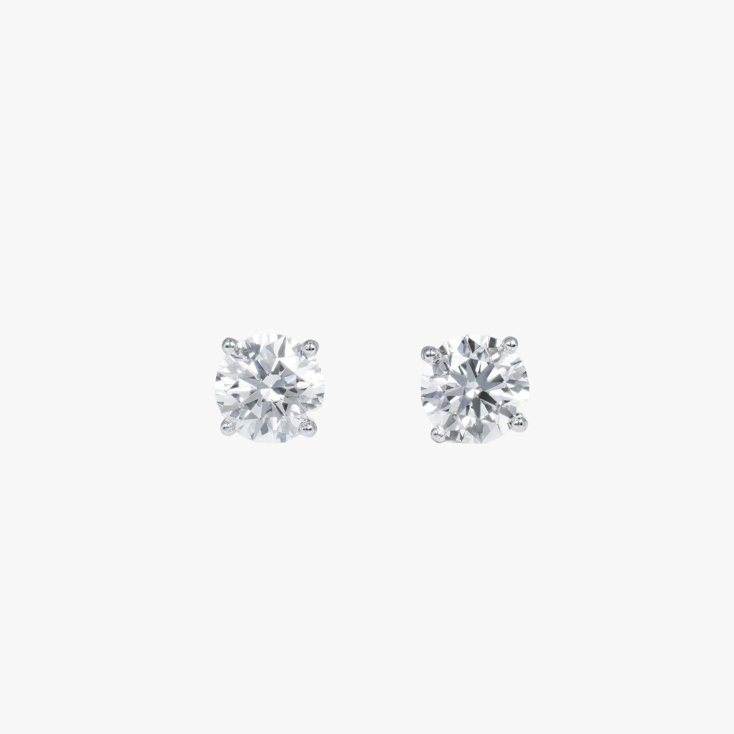 round solitaire studs wg