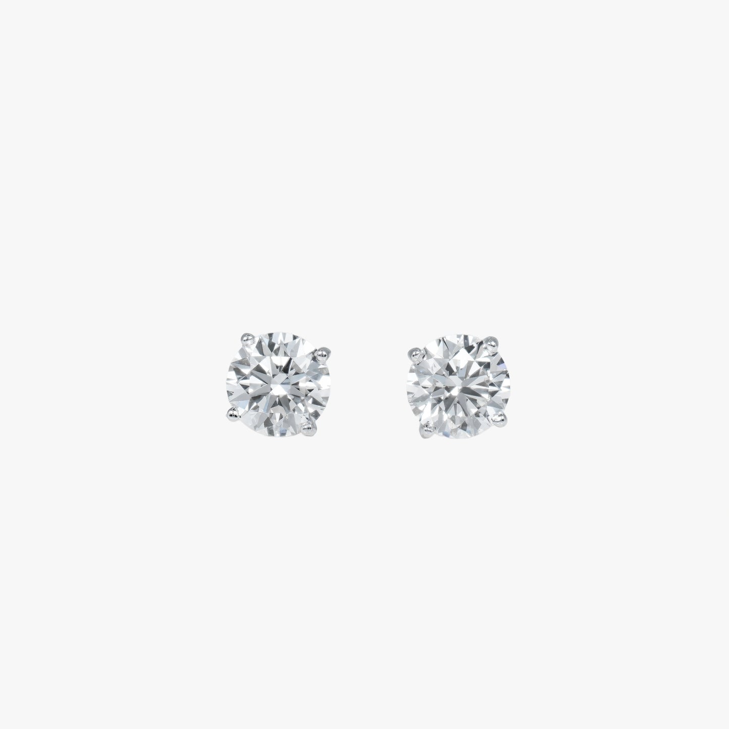 round solitaire studs wg