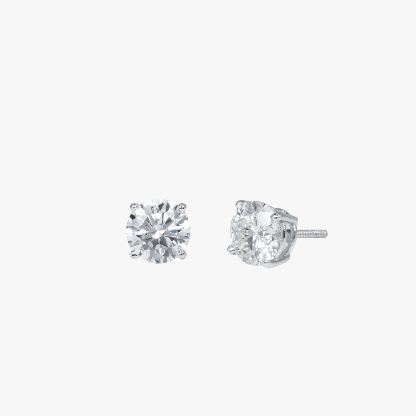 round solitaire studs wg