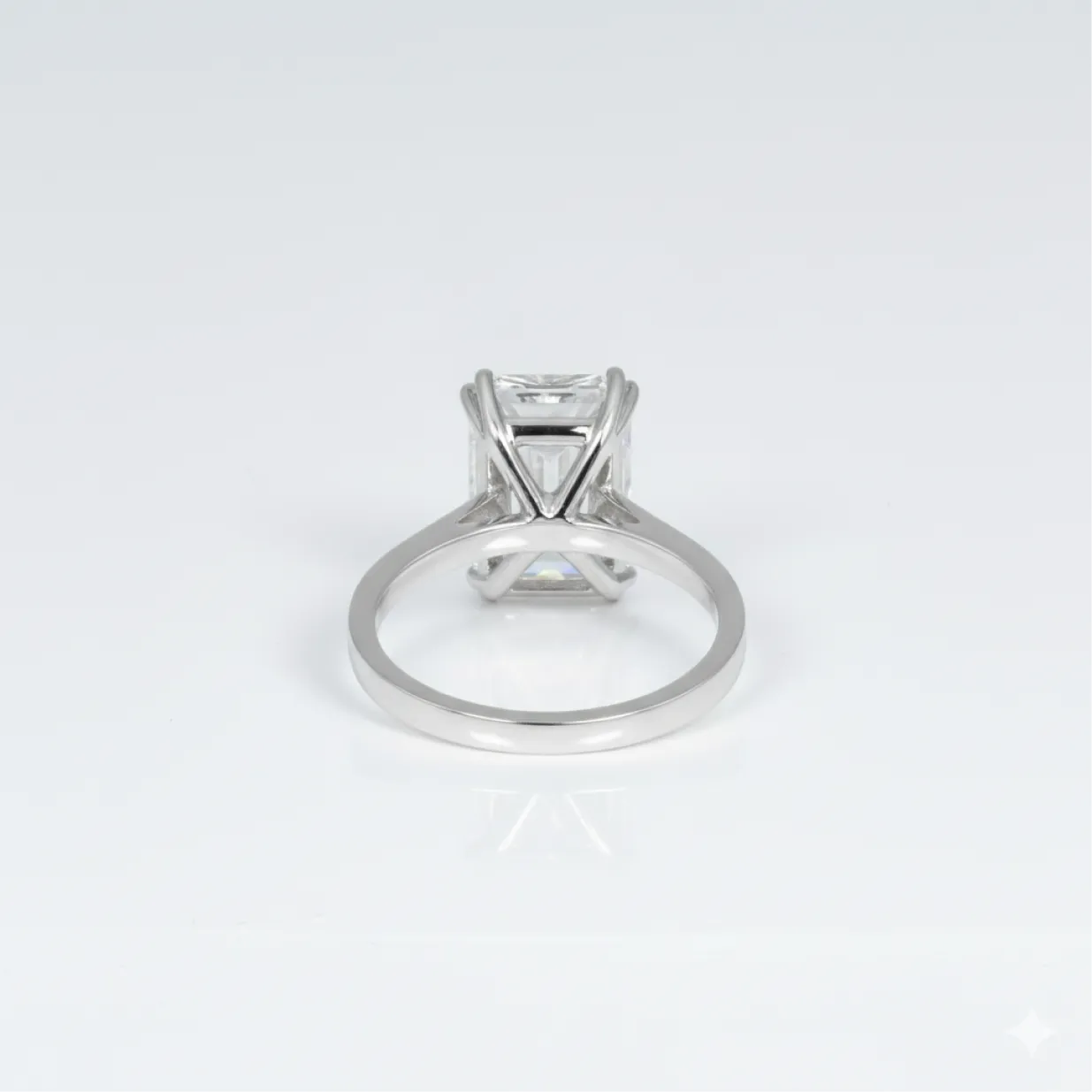 4 ct emerald solitaire ring