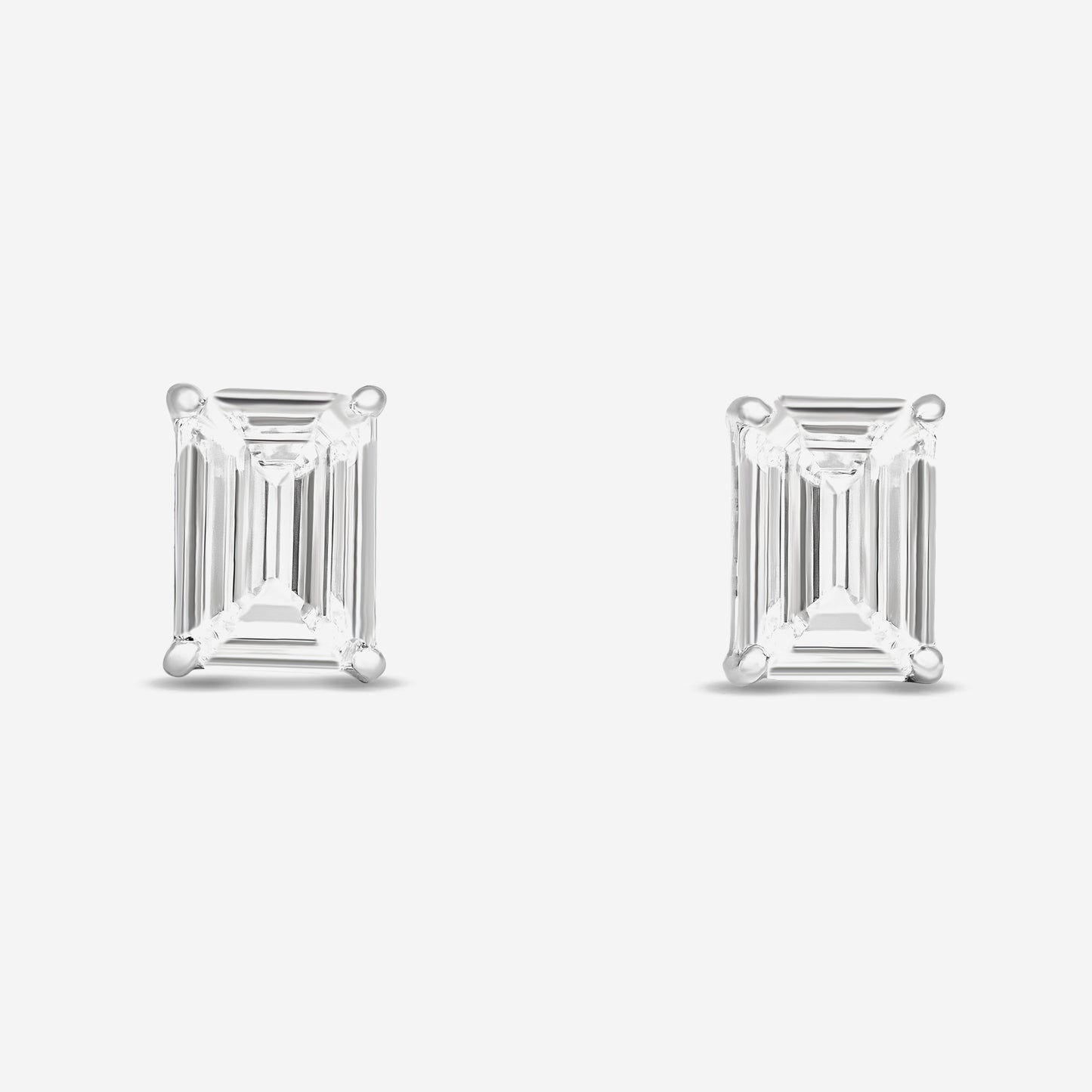 emerald solitaire studs
