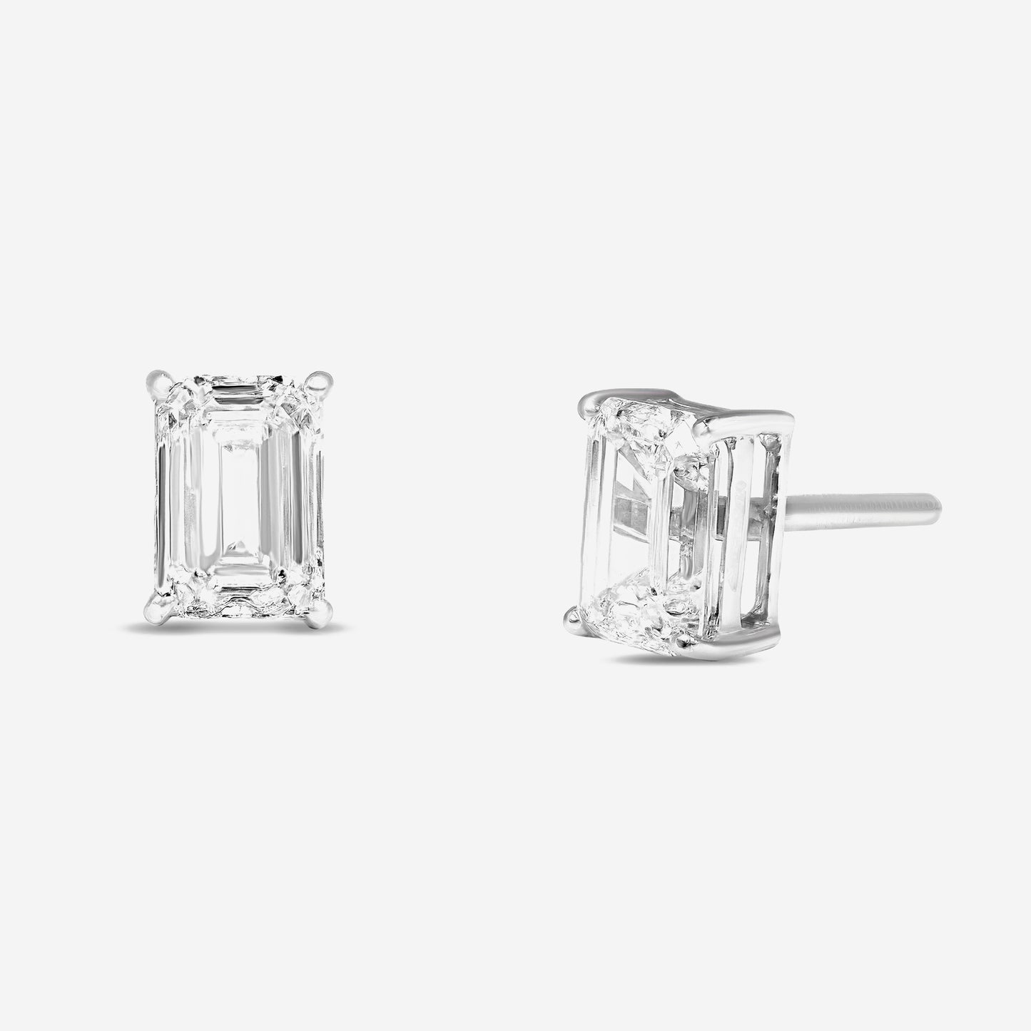 emerald solitaire studs