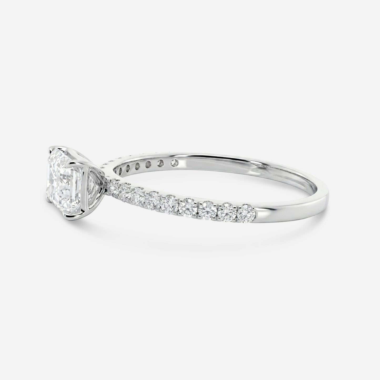 emerald e/w solitaire on pave setting