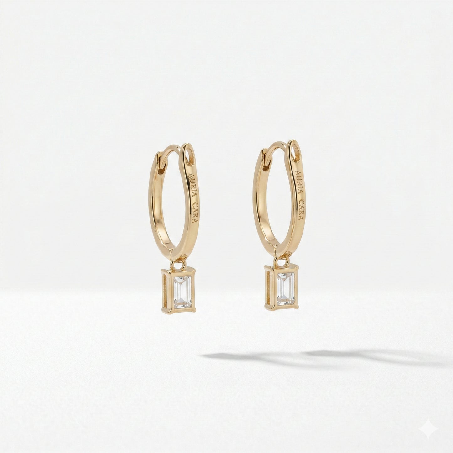 1.20ct emerald with pave hoop drop earrings