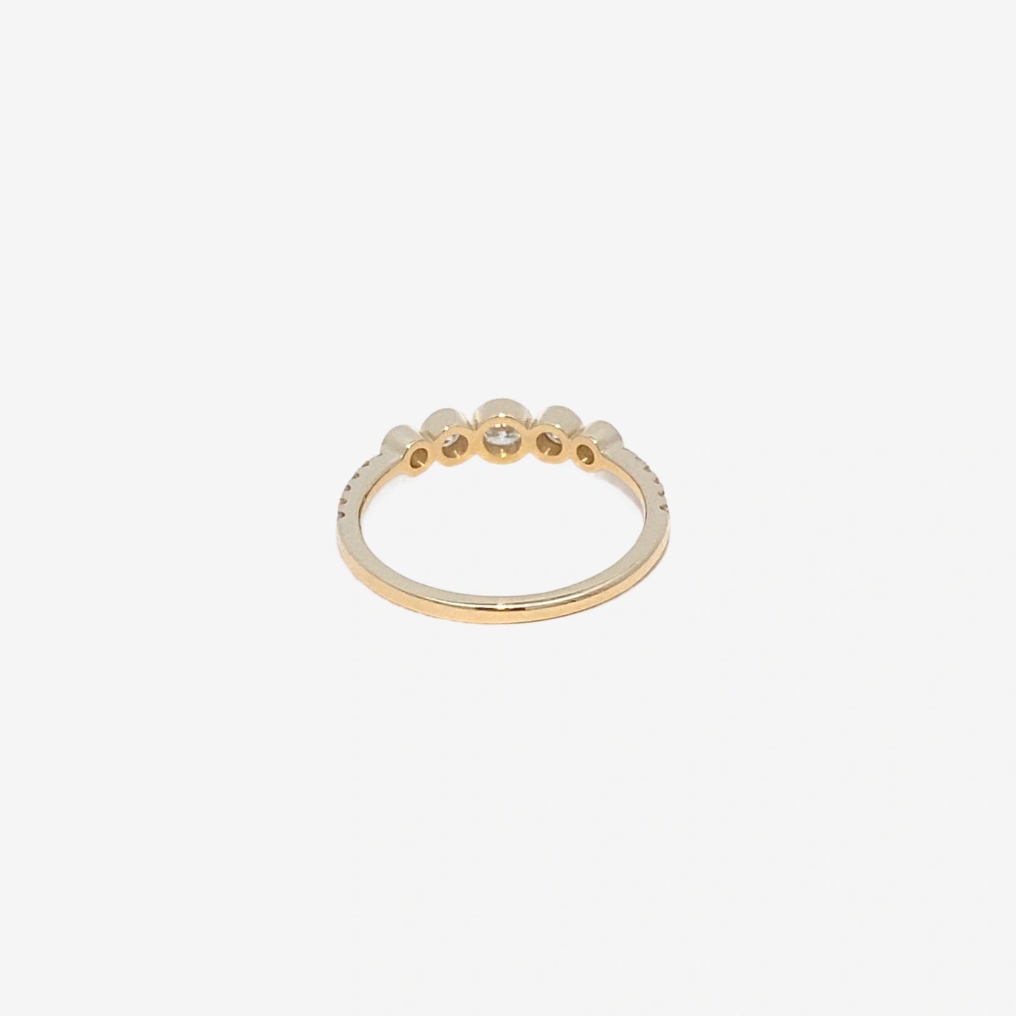0.36ct dainty round graduated with pavé band