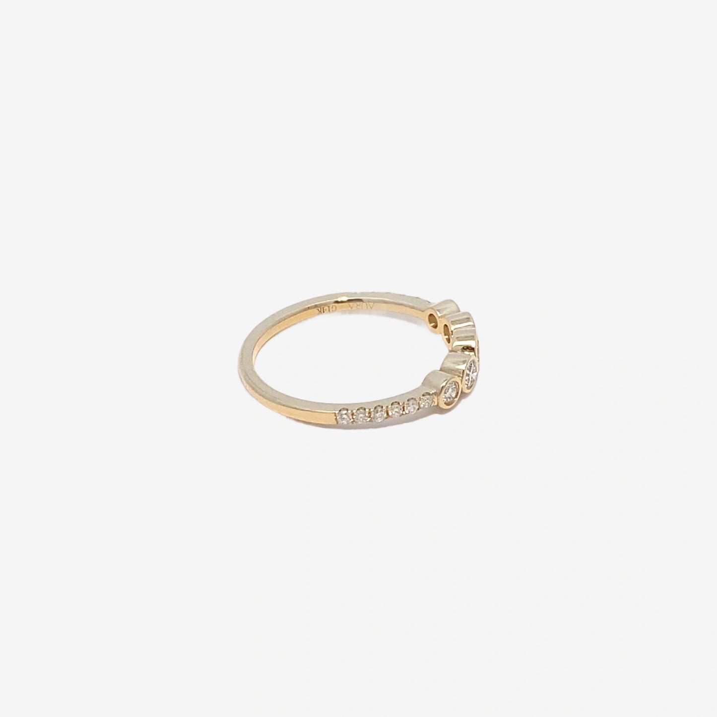 0.36ct dainty round graduated with pavé band