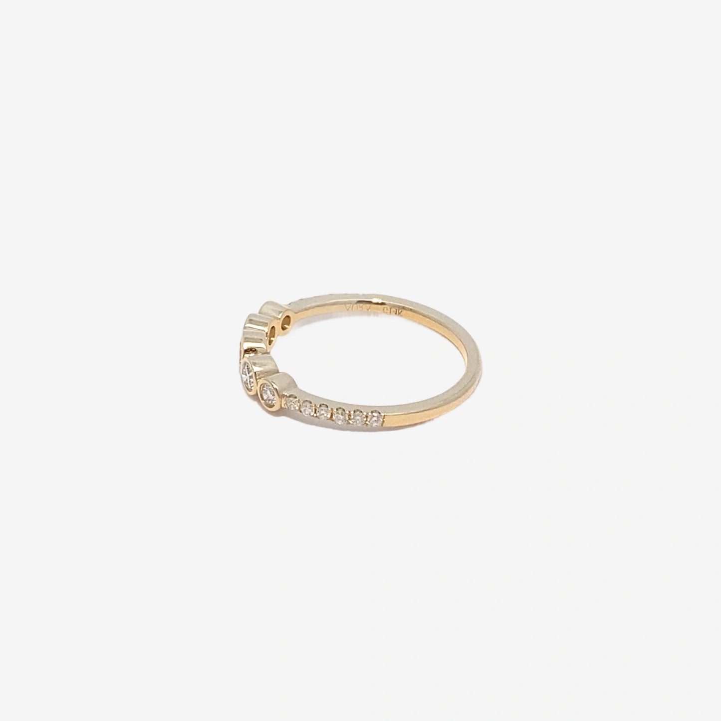 0.36ct dainty round graduated with pavé band