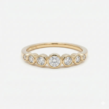 0.28CT Dainty Round Graduated Ring