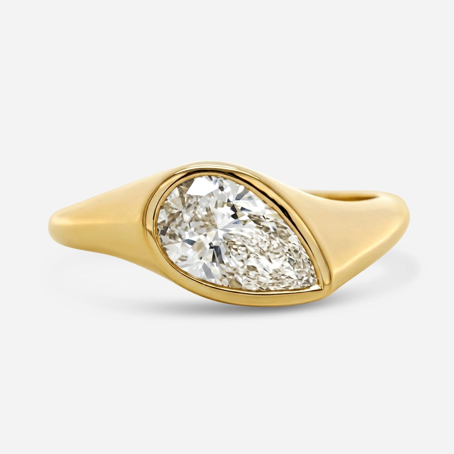 1.2ct pear slanted bezel ring