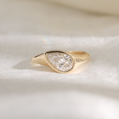1.2Ct Pear Slanted Bezel Ring
