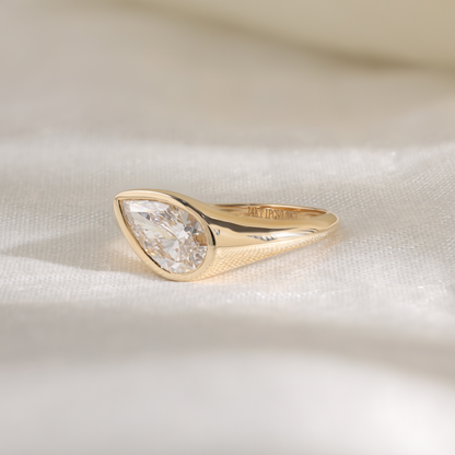1.2Ct Pear Slanted Bezel Ring