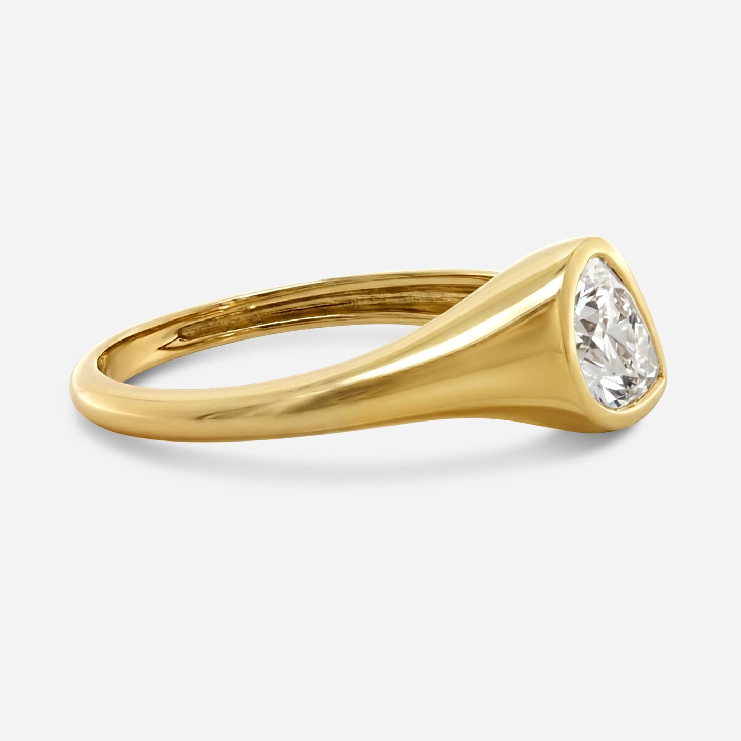1.2ct pear slanted bezel ring