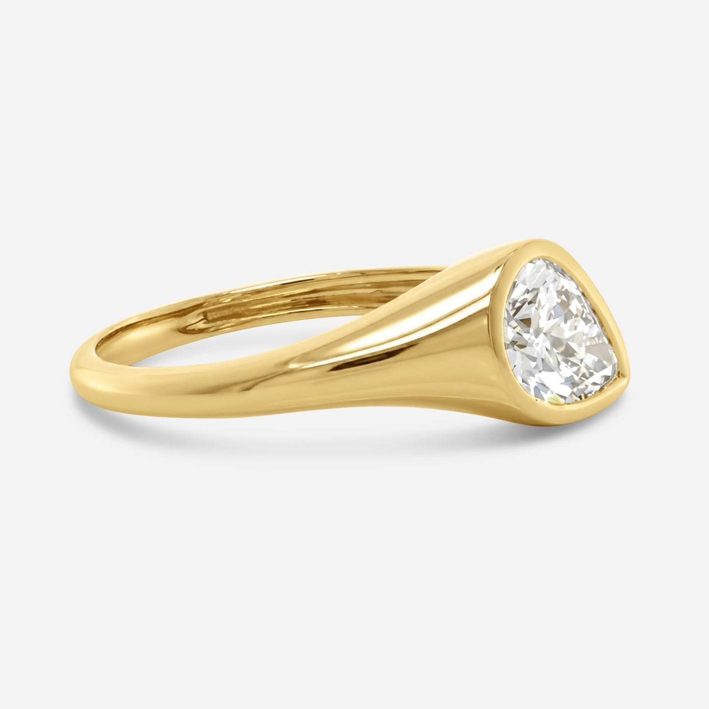 1.2ct pear slanted bezel ring