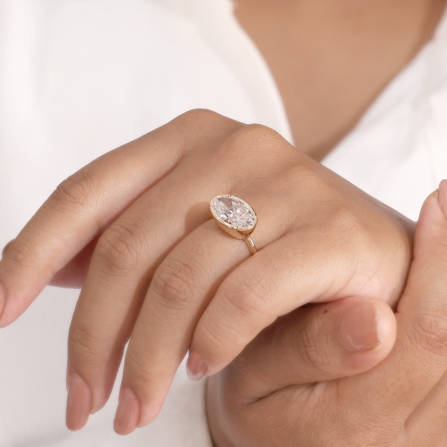 3.5ct oval e/w 4-prong bezel ring