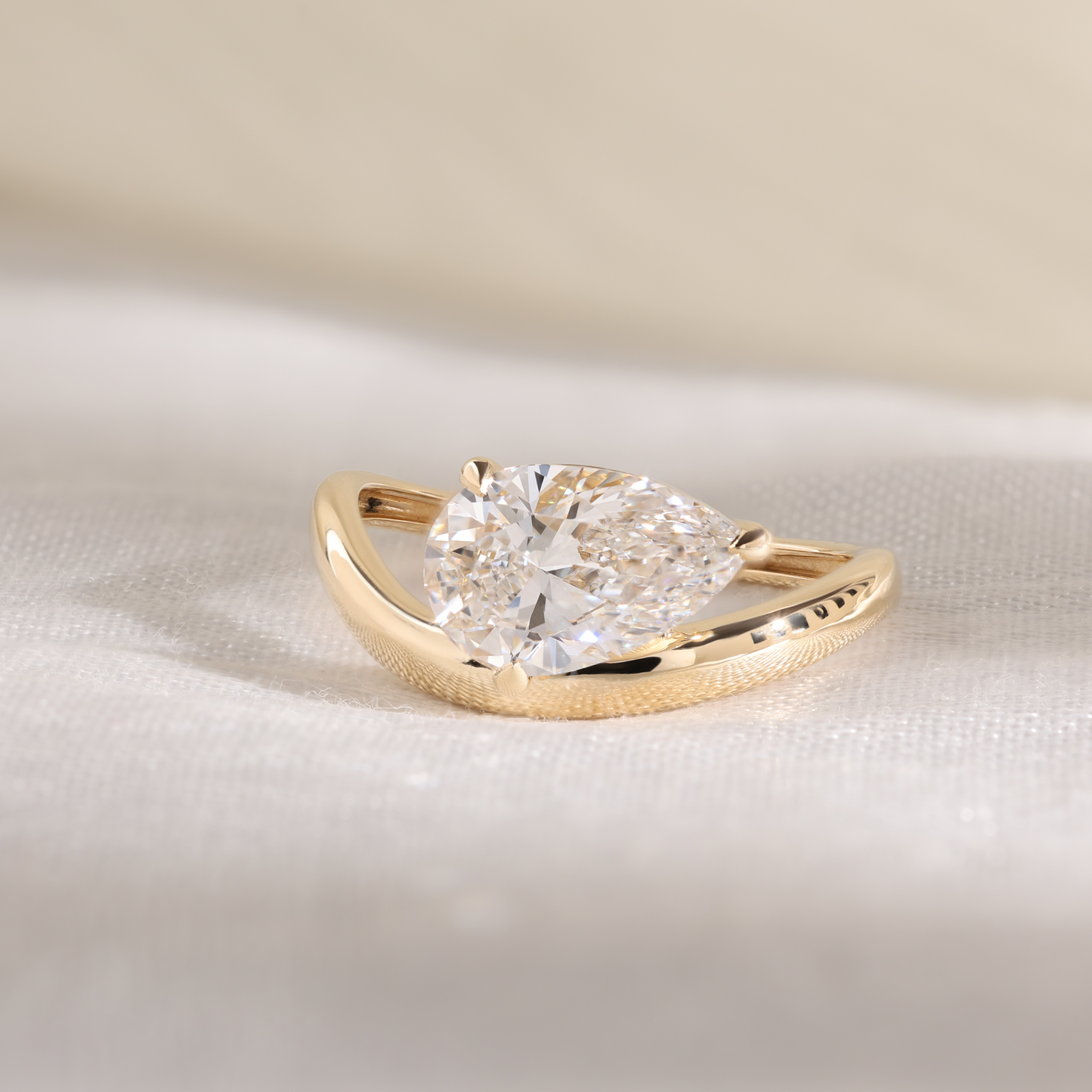2ct pear wave solitaire